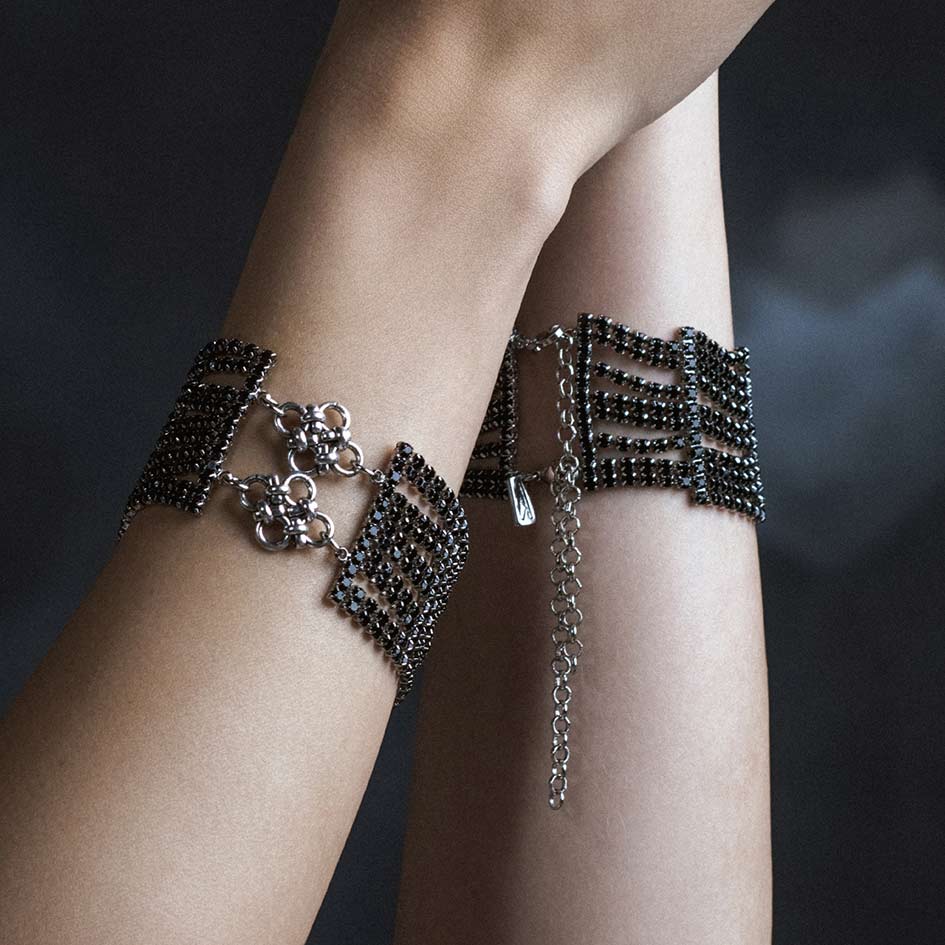 Model wearing Maryse silver chainmail dazzle chain bracelet pair