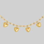 gold floral heart charm necklace