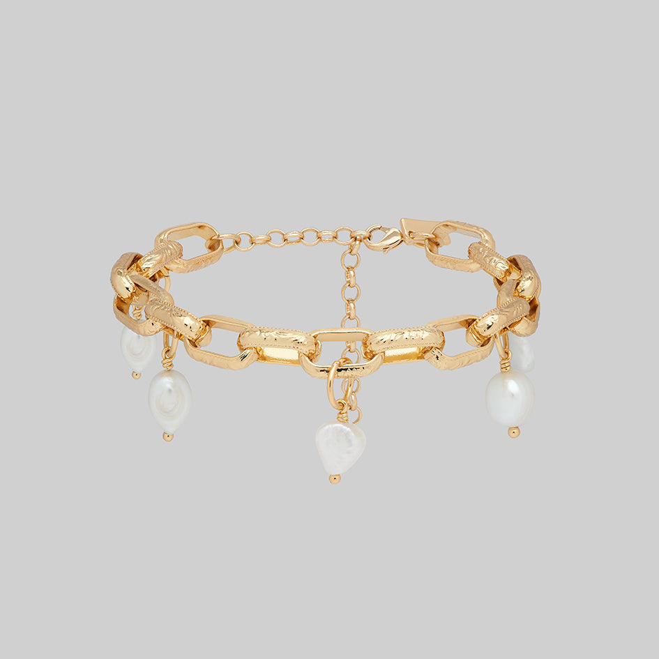 Gold link chain bracelet with pearl charms 