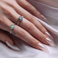 clawed gemstone heart silver ring