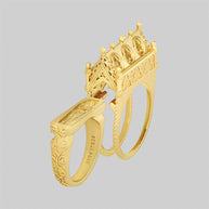 gold secret tomb gothic cathedral double ring