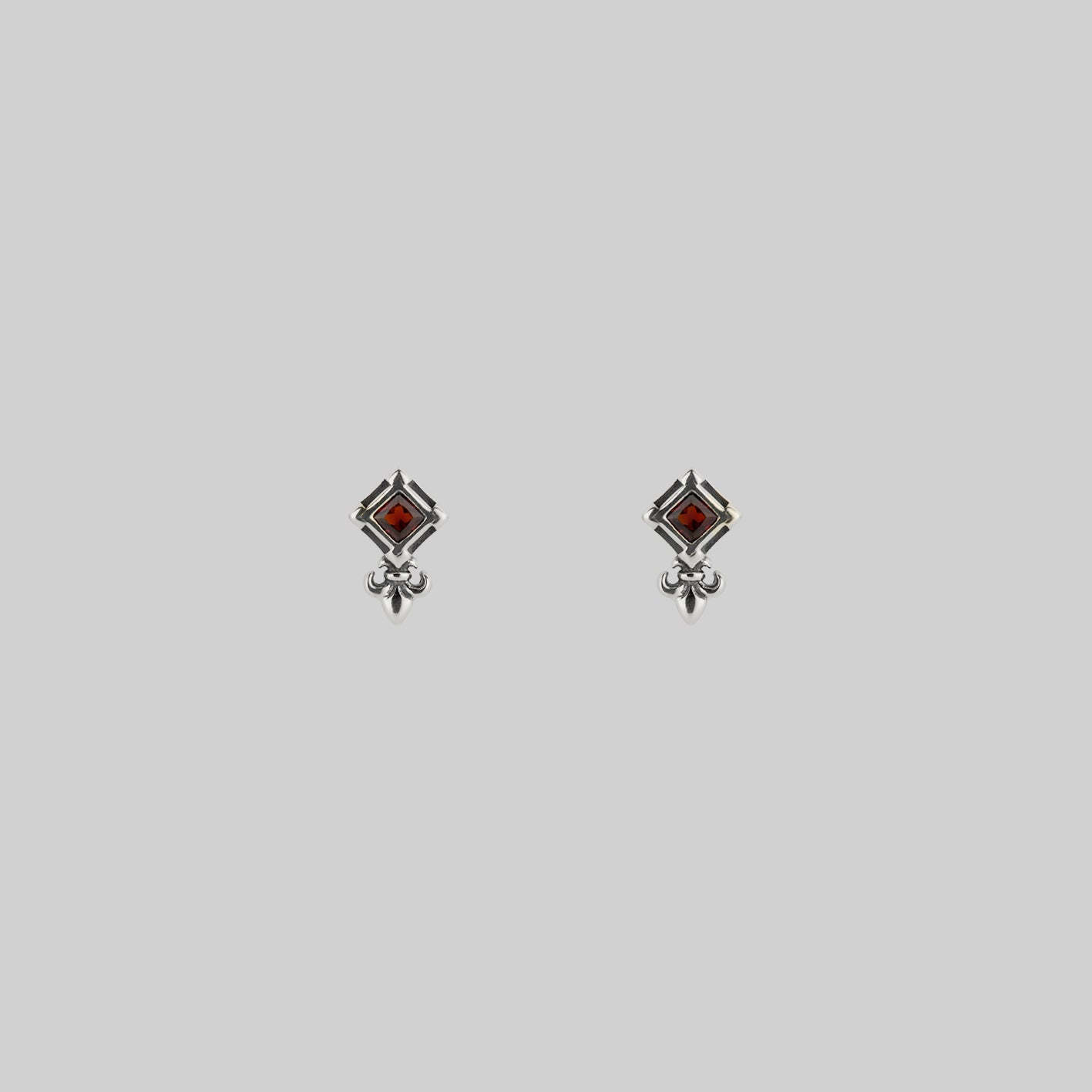 silver tiny fleur-de-lis garnet stud earrings