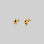 gold small fleur-de-lis garnet stud earrings