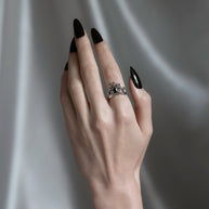 Gothic silver victorian inspired ring with black onyx gemstone and skulls