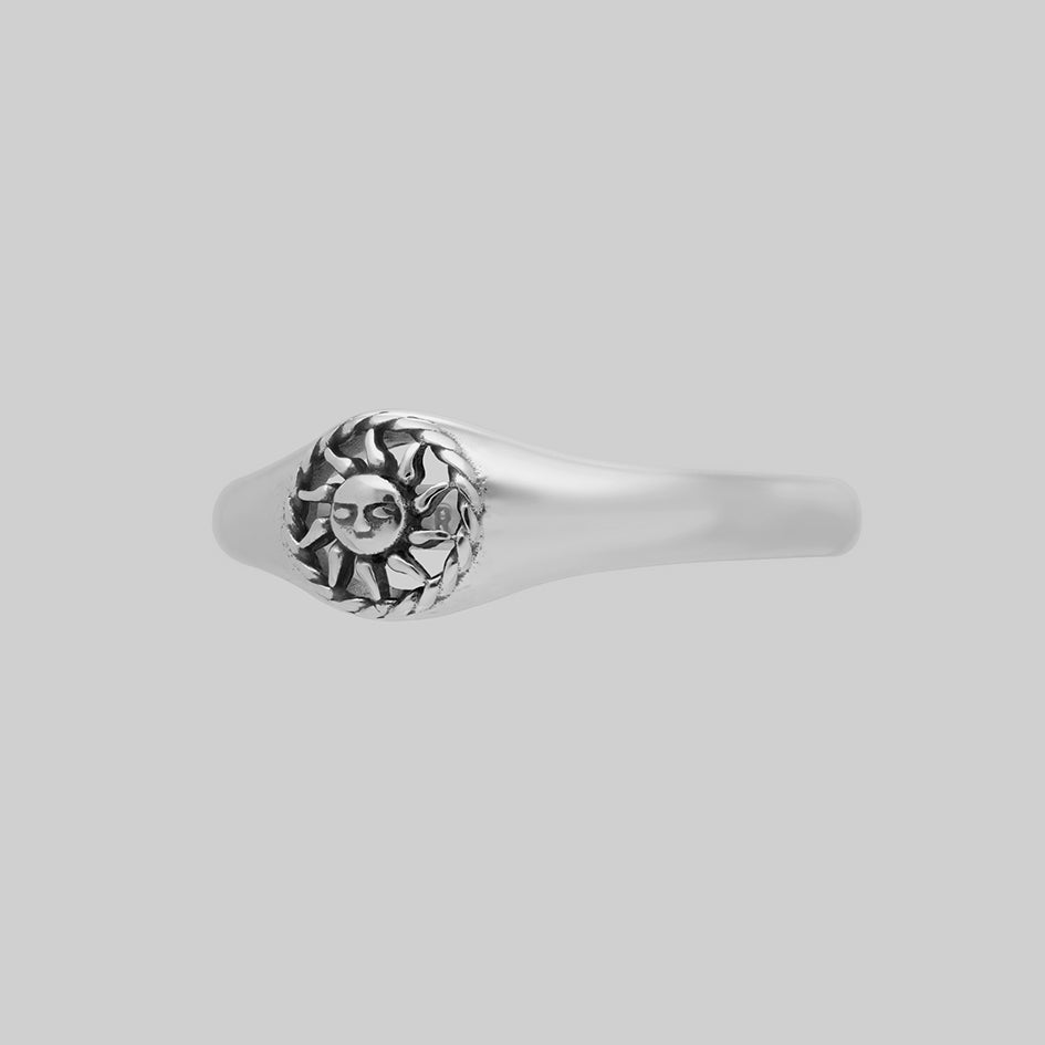 Silver celestial sun signet ring