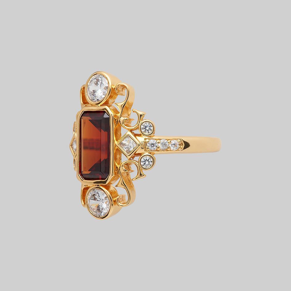 gold red gemstone cocktail gothic ring