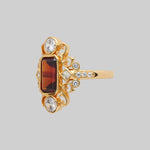 gold red gemstone cocktail gothic ring