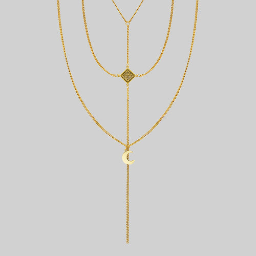 SOLSTICE. Sun & Moon Lariat Necklace - Gold