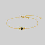 gothic gold black onyx stone dainty bracelet with nature detail alternative jewellery