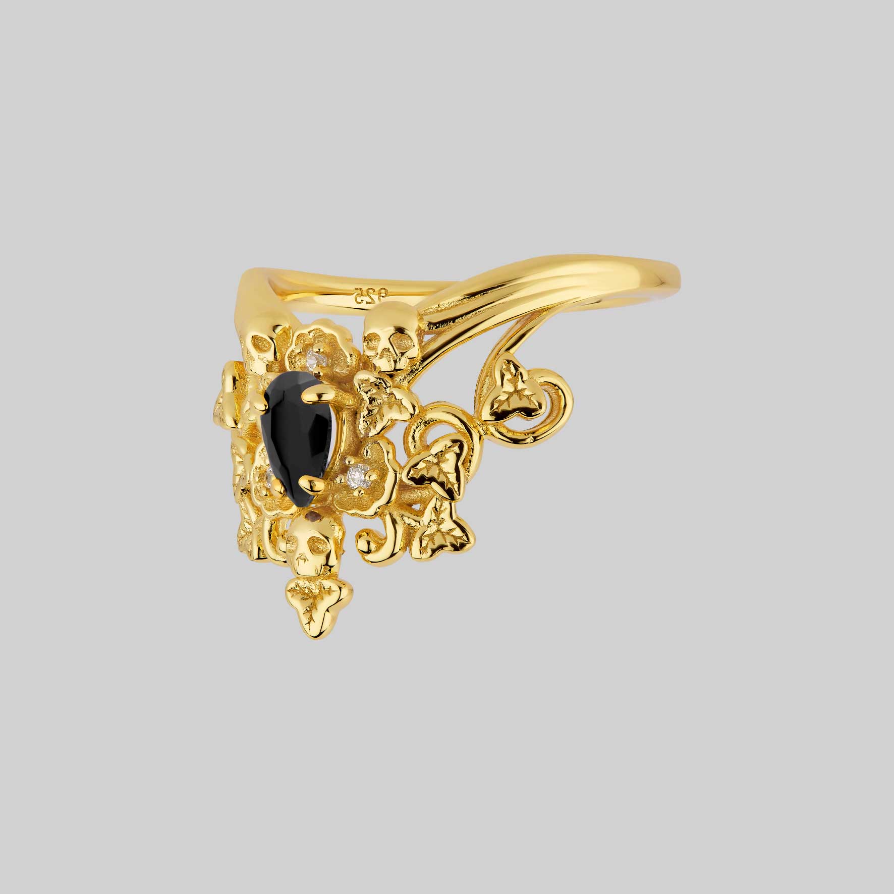Gothic gold ornate black onyx ring with skulls