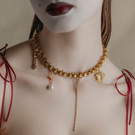 Gold charm trinket chain necklace