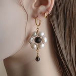gold floral pearl statement earrings
