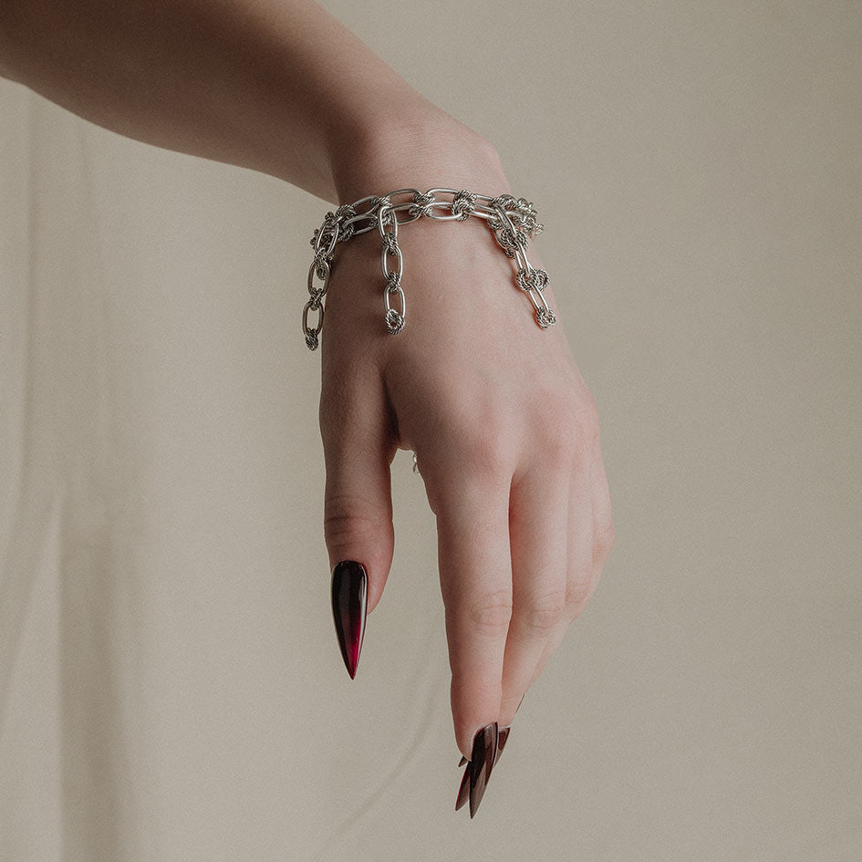 Silver twisted double chain dangly bracelet