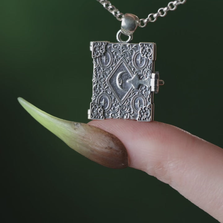 Book of spells locket necklace, closed