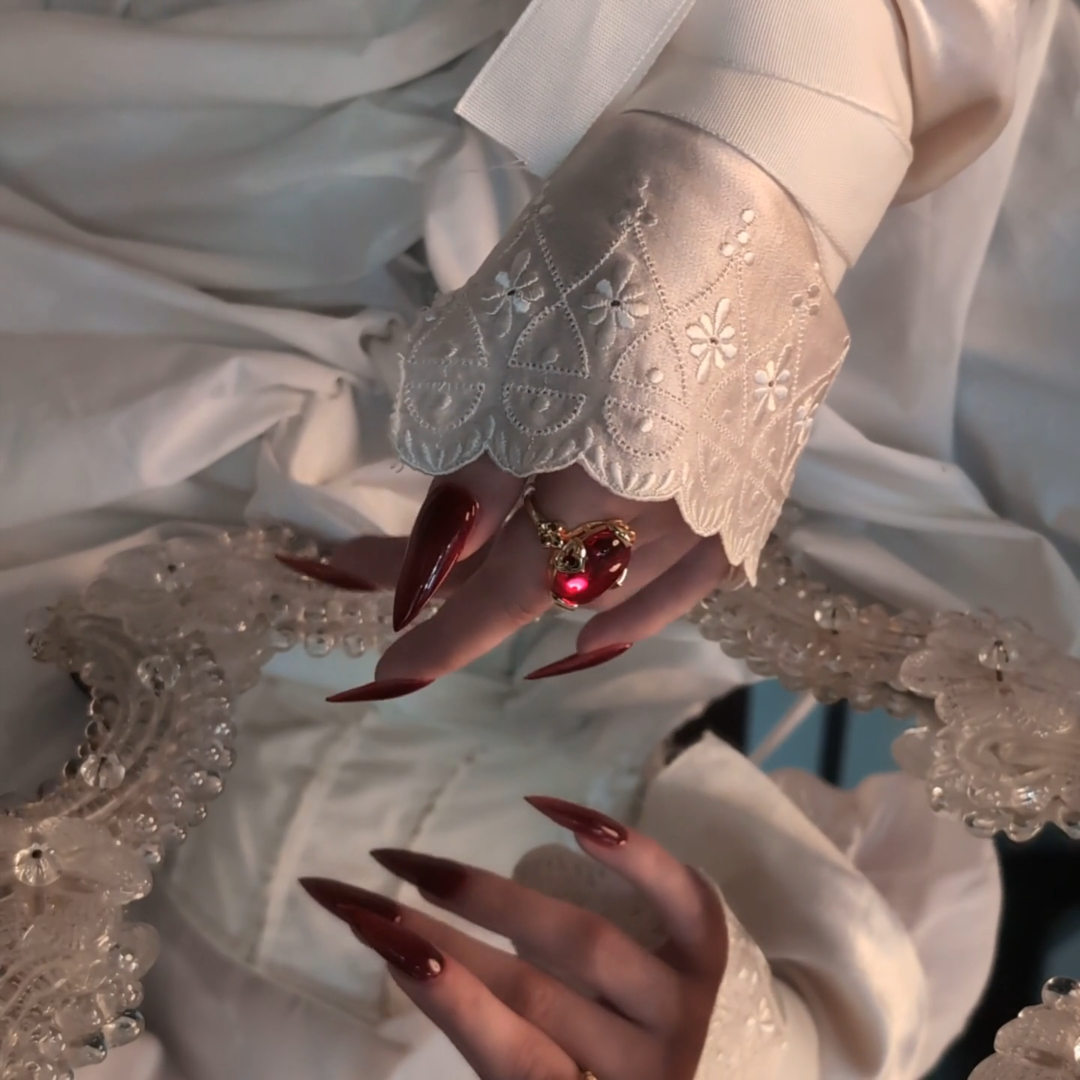 gold vampesque gothic fleur-de-lis red stone ring