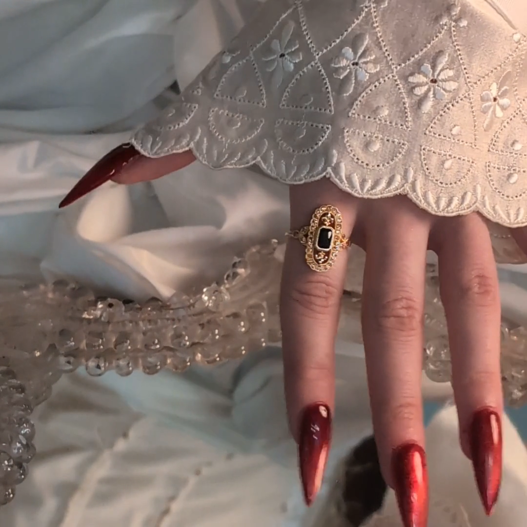 CZ statement ring with onyx and fleur de lis