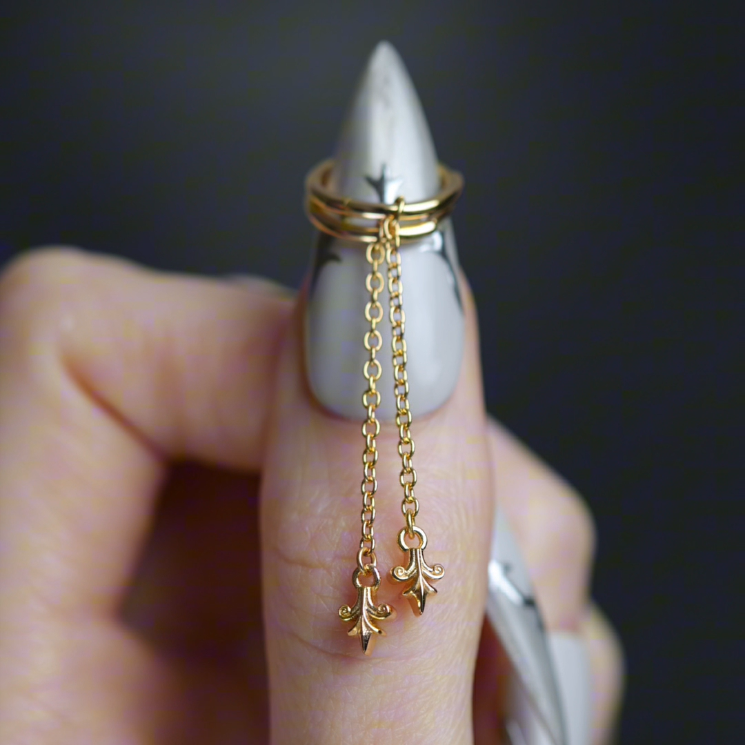 Video of Fiora heraldic lily drop hoop earrings