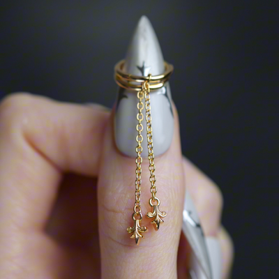 Video of Fiora heraldic lily drop hoop earrings