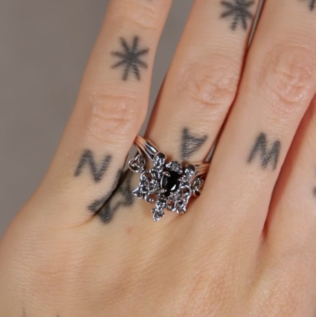 Gothic silver victorian inspired ring with intricate nature detail, black onyx gemstone and skulls