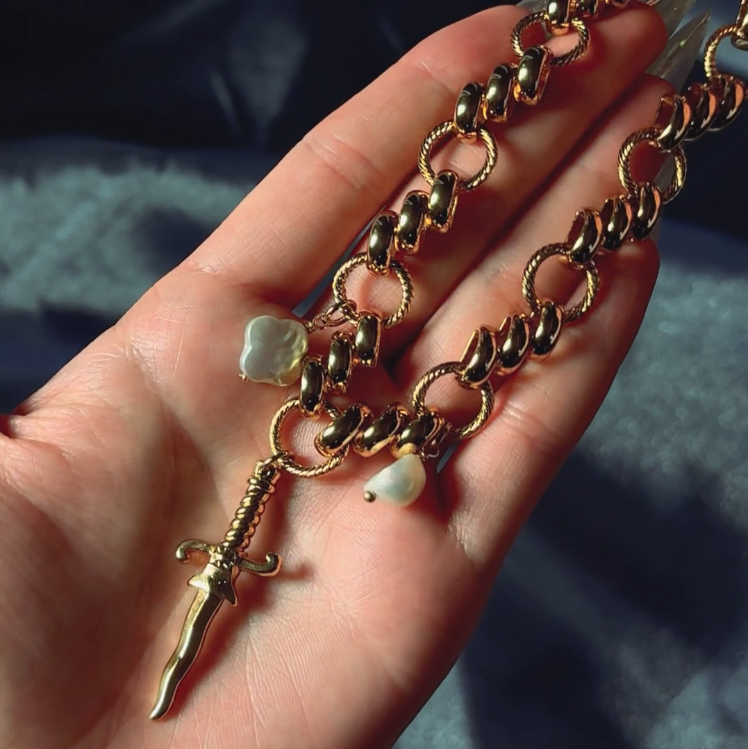 dagger pearl quatrefoil charm gothic necklace gold twisted rope chain