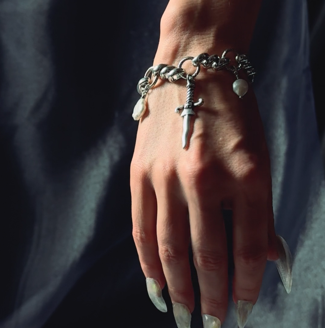 dagger pearl quatrefoil charm gothic bracelet silver twisted rope chain