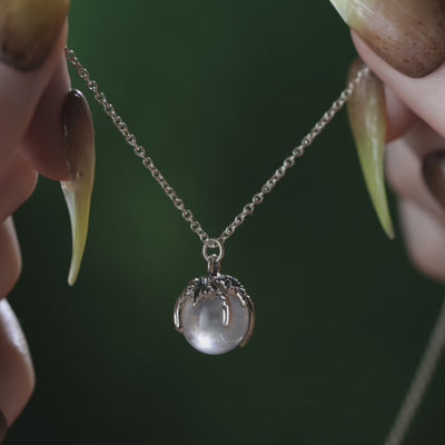 Clear quartz crystal ball pendant necklace