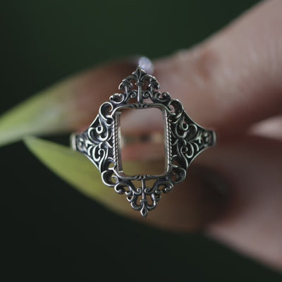 Ornate frame ring