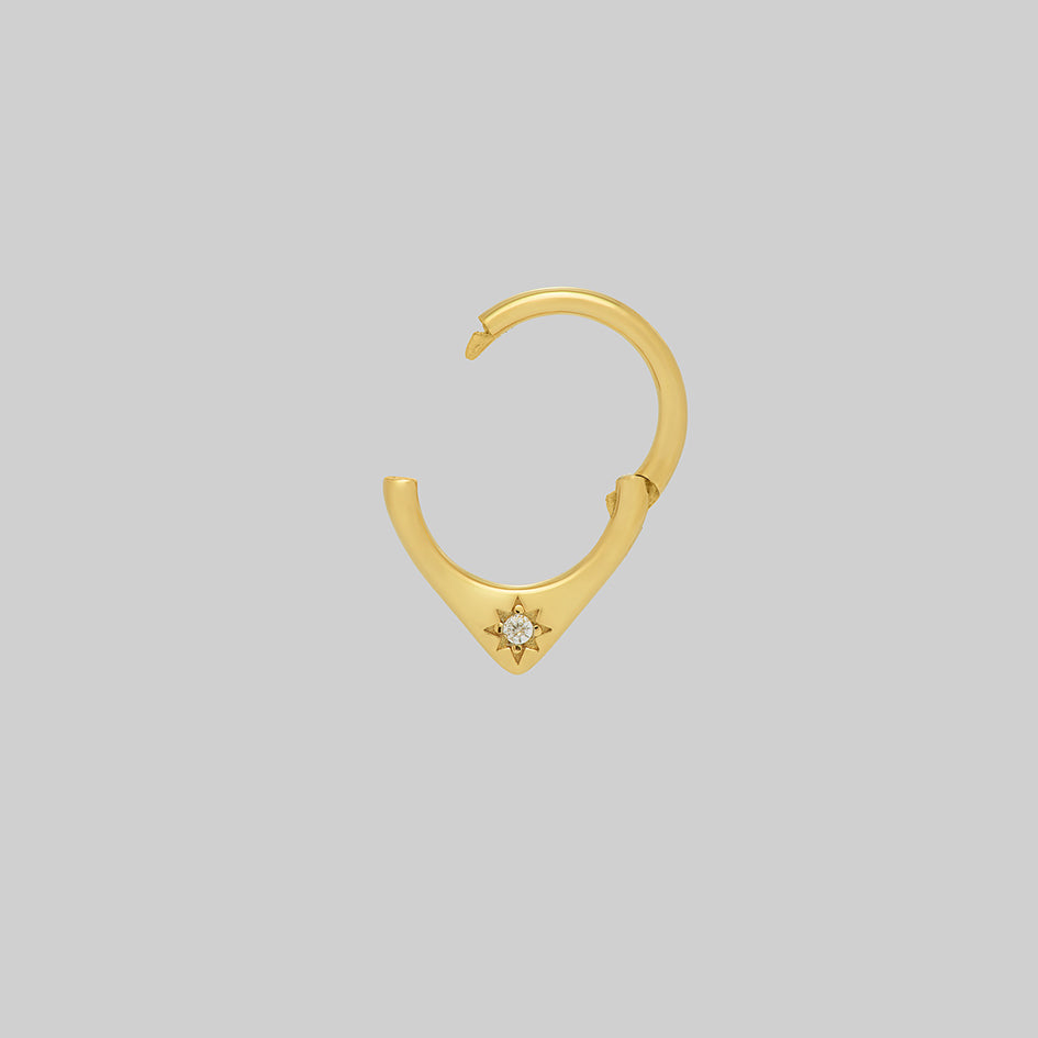 gold gothic starburst clicker ring septum piercing 