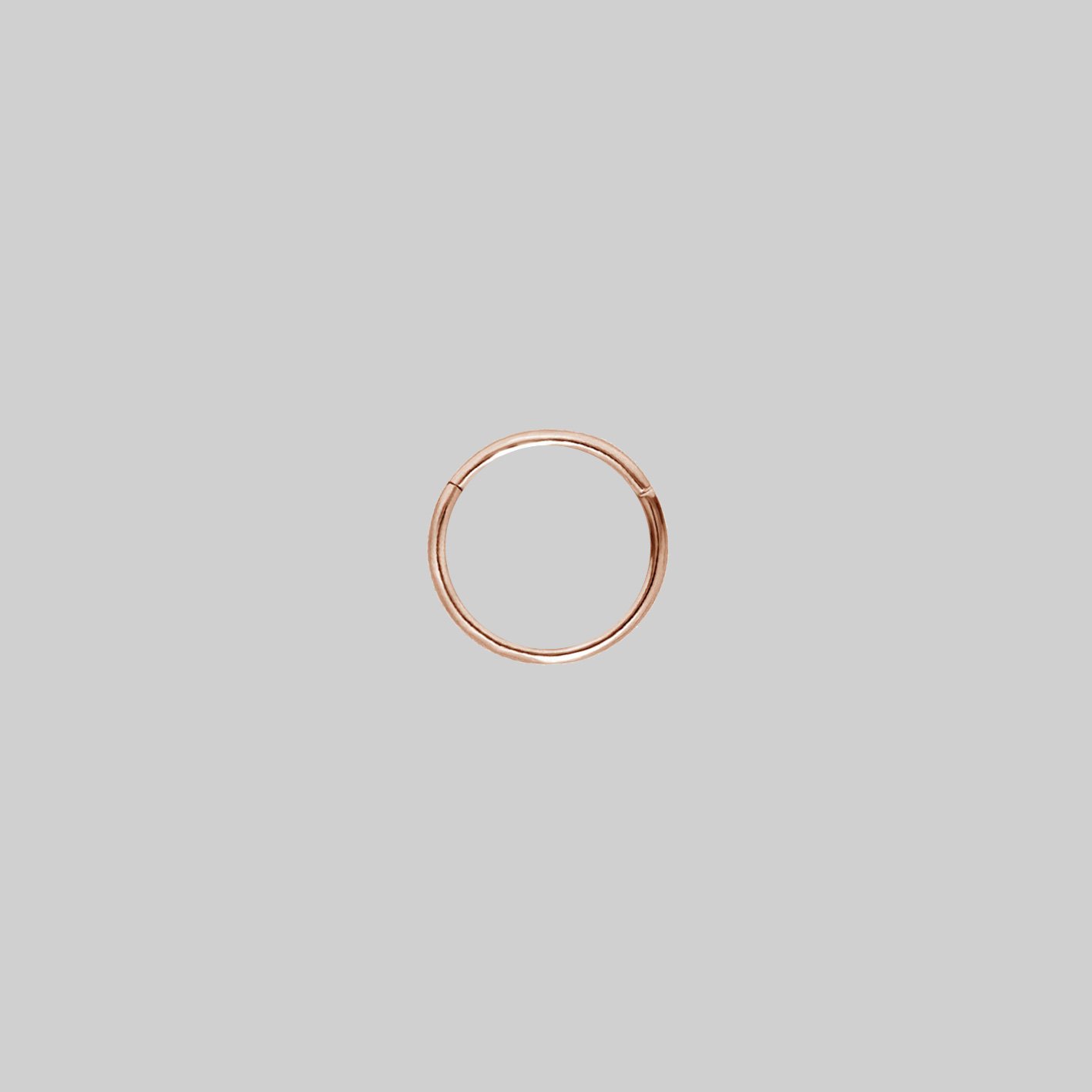 A simple rose gold clicker ring 8mm x 1mm