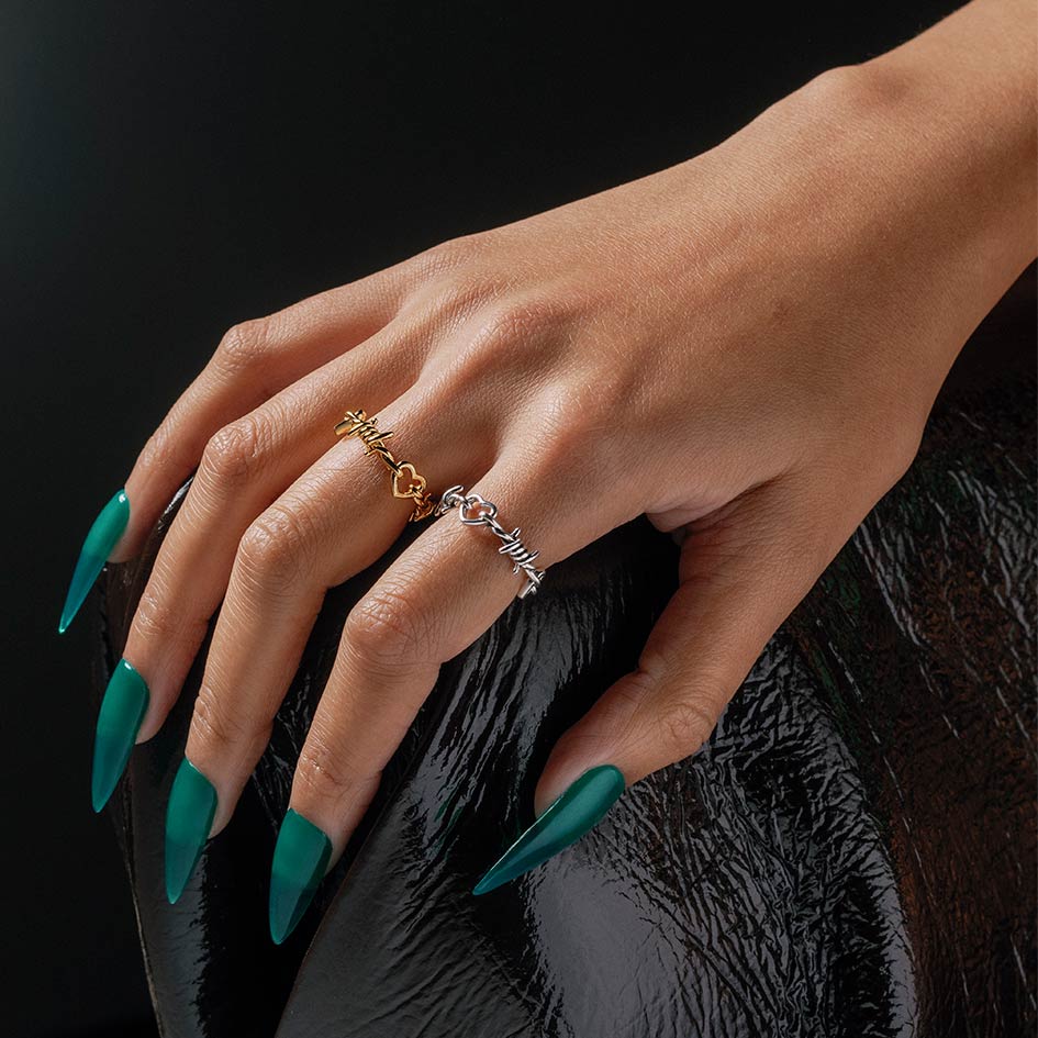 Barbed wire and heart ring 