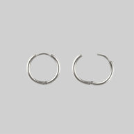 FORBIDDEN. Heart Dagger Hoop Earrings - Silver