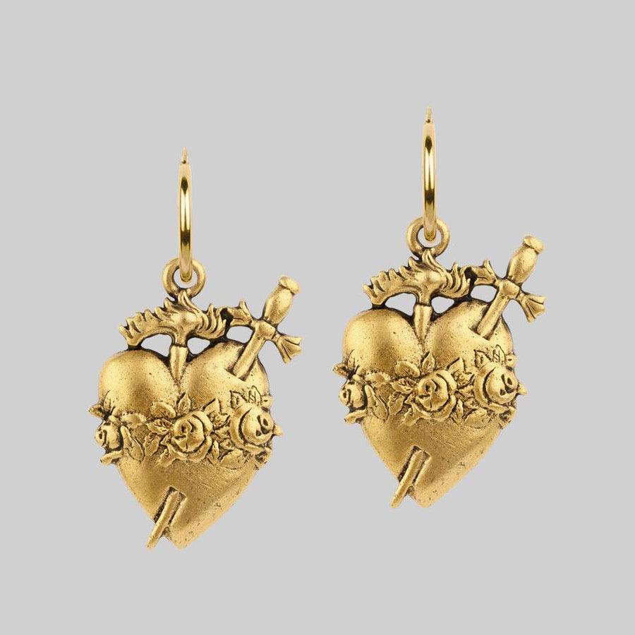 Large gold sacred heart earrings