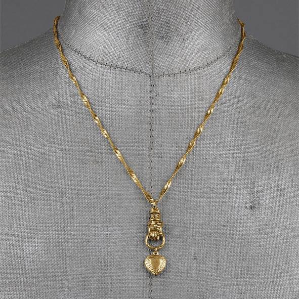 Hand and heart pendant necklace