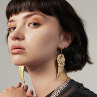 Large gold angel wing earrings