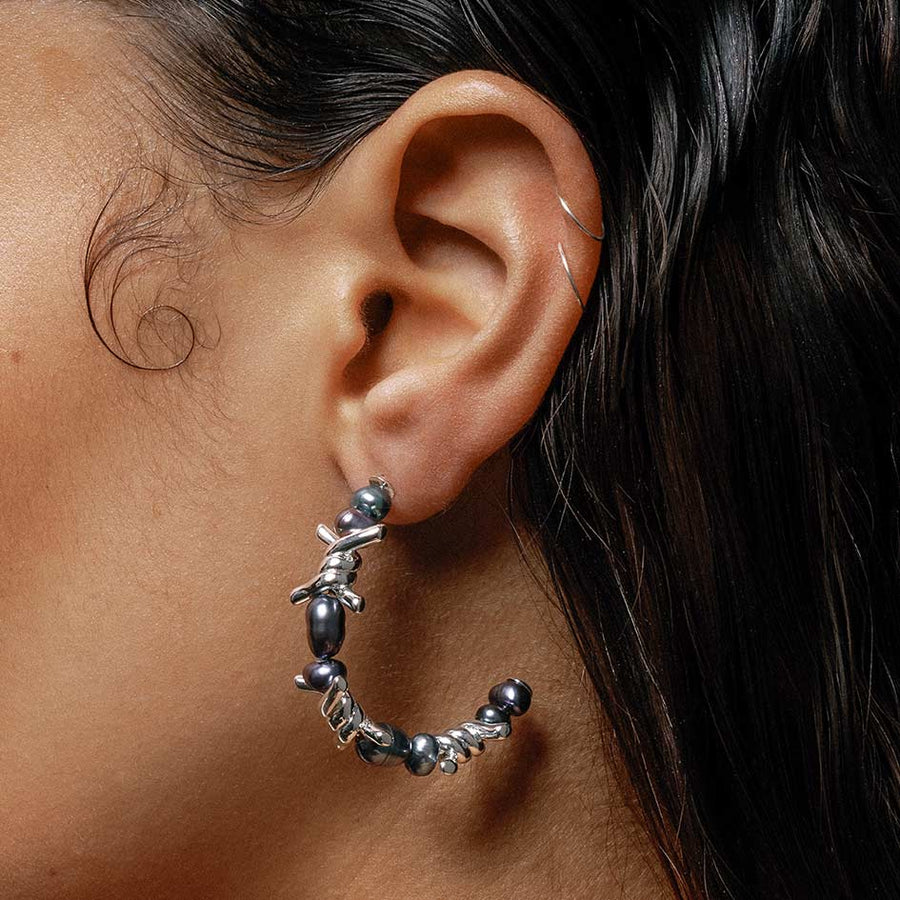 Pearl and barbed wire hoop earrings