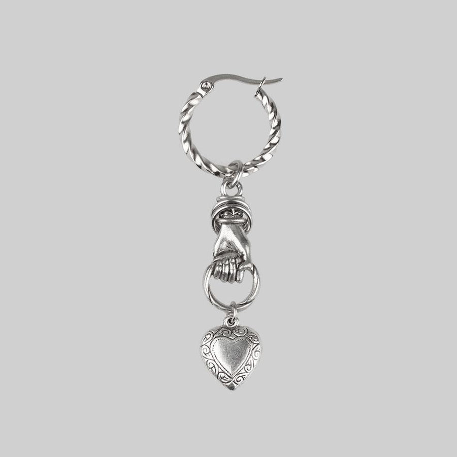 silver hand holding heart single earring