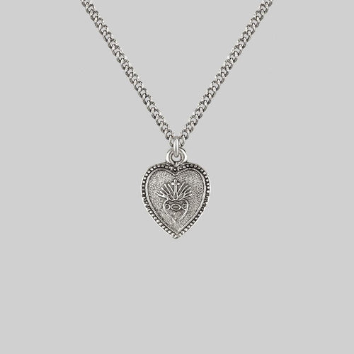 ALL OF ME. Hand Grasping Heart Necklace - Silver