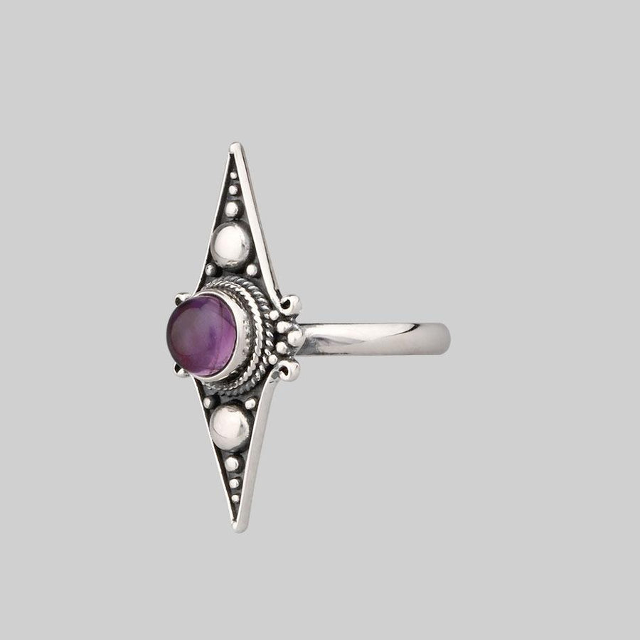 Silver ring deals with amethyst stone