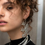 Silver flower hoop earrings