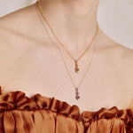 INSIDIOUS. Amethyst Coiled Snake Necklace - Gold