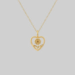 gold heart and flower necklace