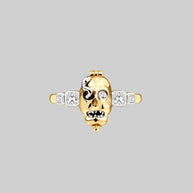 gold skull and snake gemstone ring 