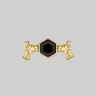 black gemstone and snake ring