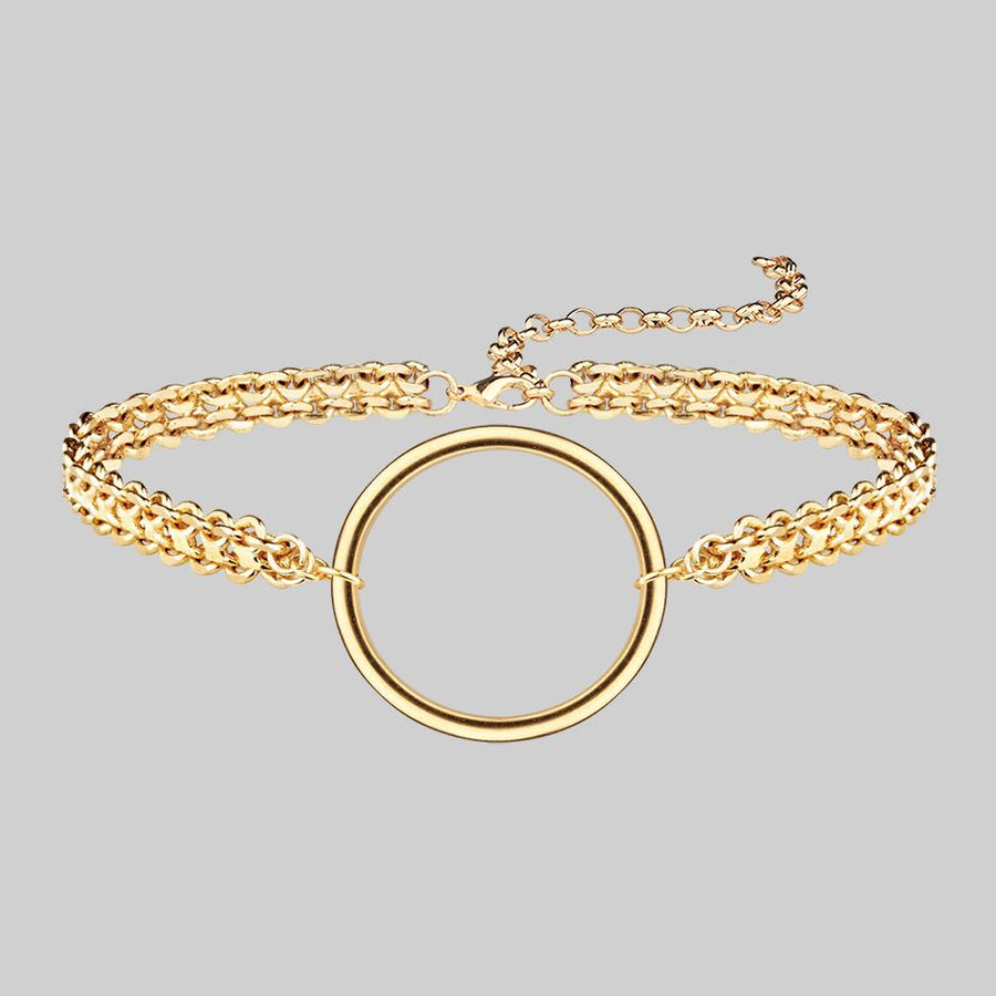 thick gold choker with ring