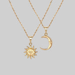 mismatch sun and moon layering necklaces 