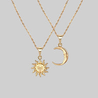 mismatch sun and moon layering necklaces 