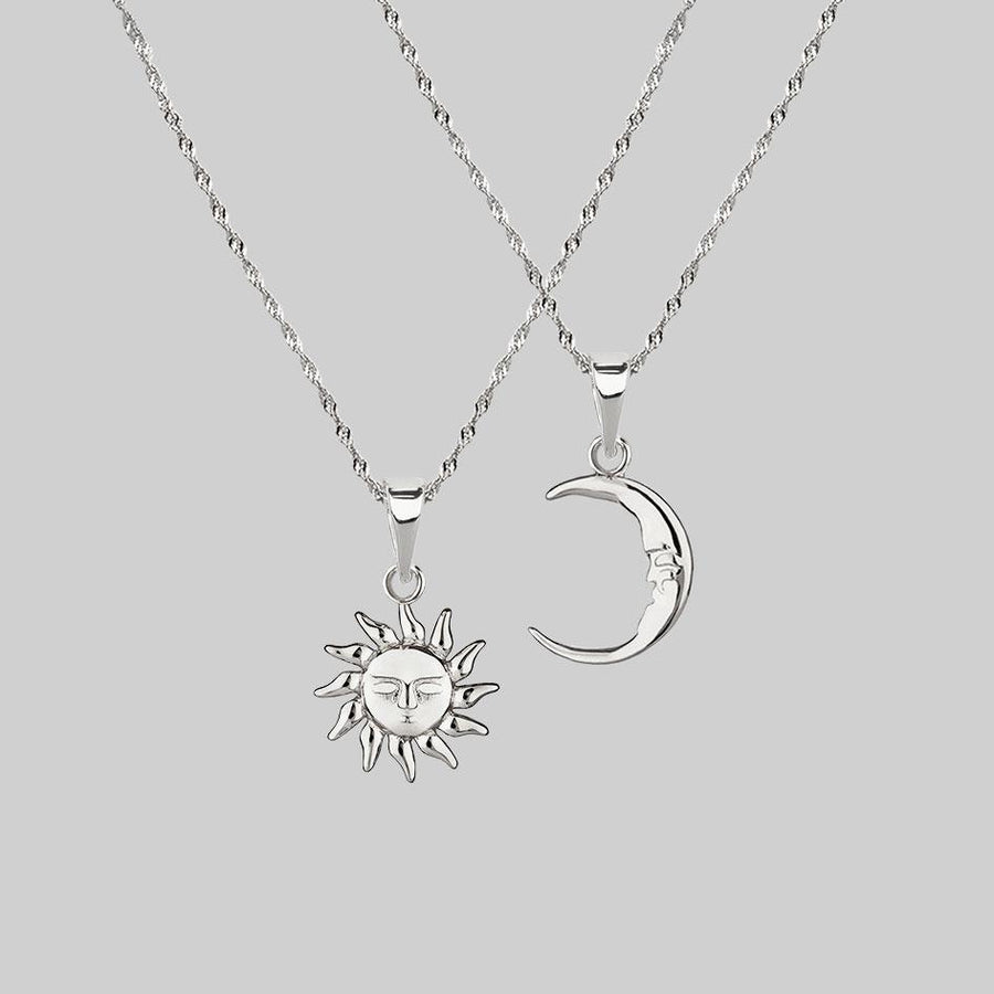 mismatch sun and moon layering necklaces 
