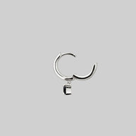 silver hoop earring with black heart
