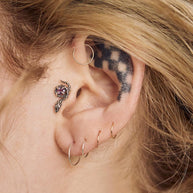 INSIDIOUS. Amethyst Coiled Snake Stud Earring - Silver