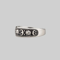 thick silver band ring with sun and moon 